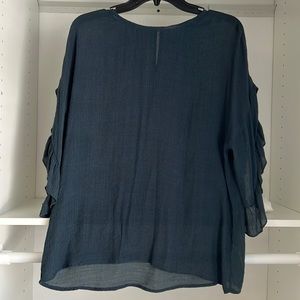 Navy blue blouse with ruffle sleeves